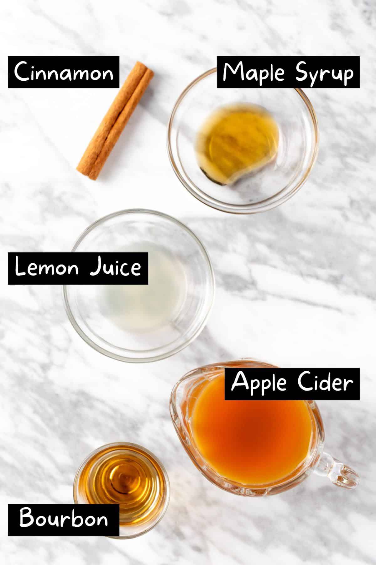 The ingredients needed to make the apple cider hot toddy.