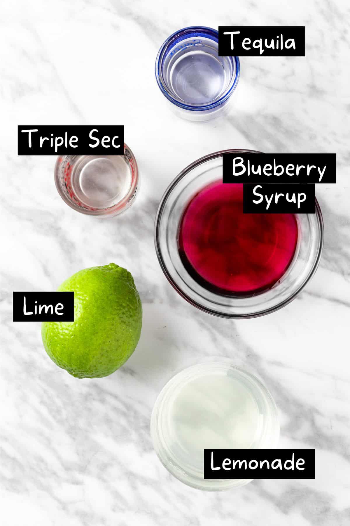 The ingredients needed to make the blueberry lemonade margarita.