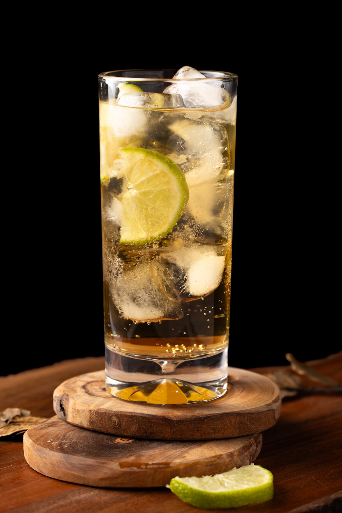 A bourbon rickey garnished with lime.