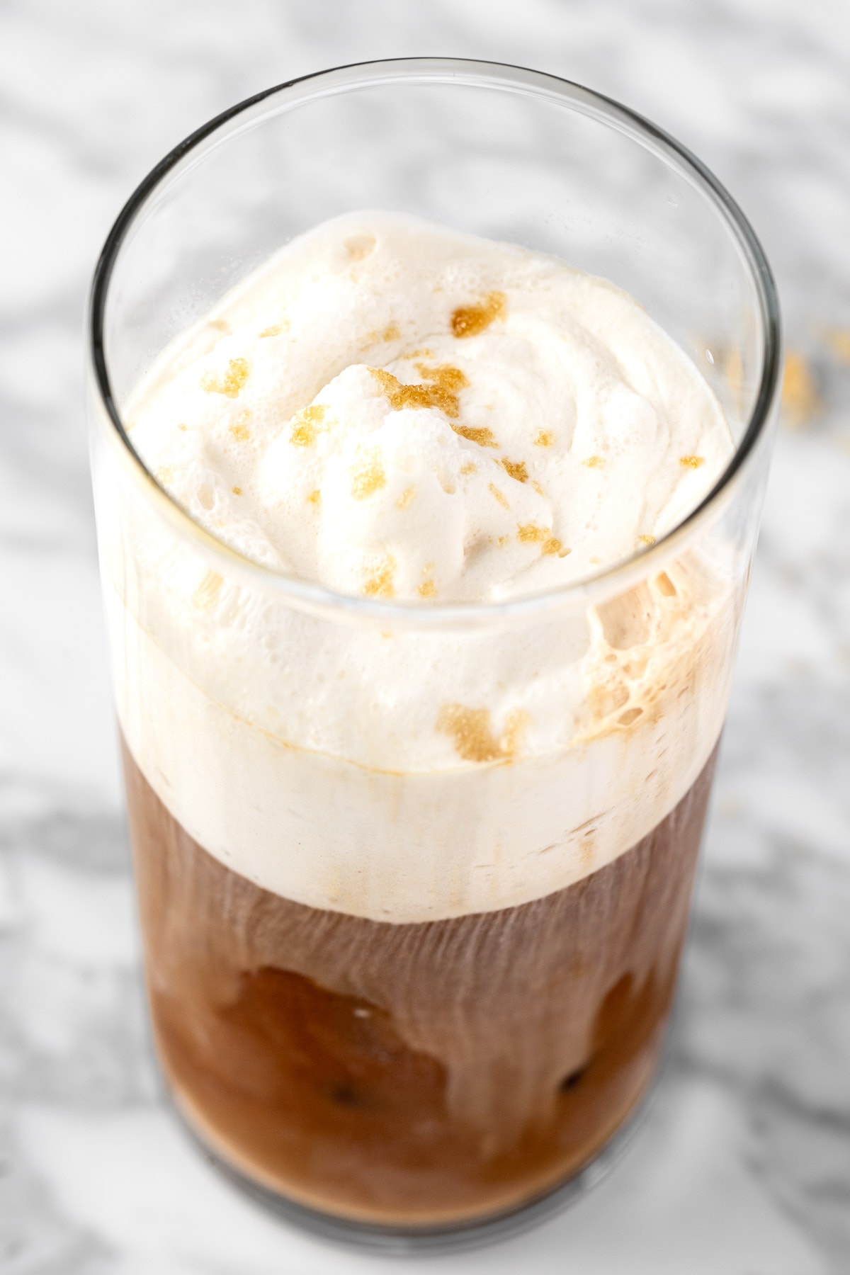 Brown sugar cold foam on top of cold brew coffee.