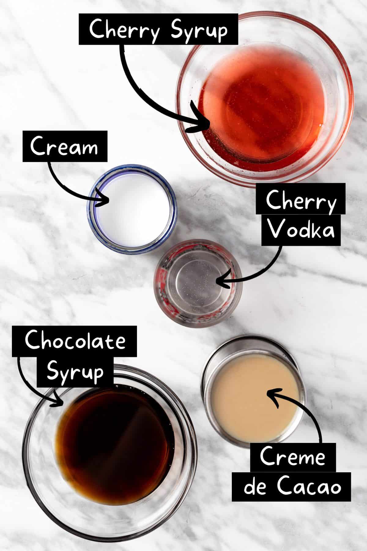 The ingredients needed to make the chocolate cherry martini.