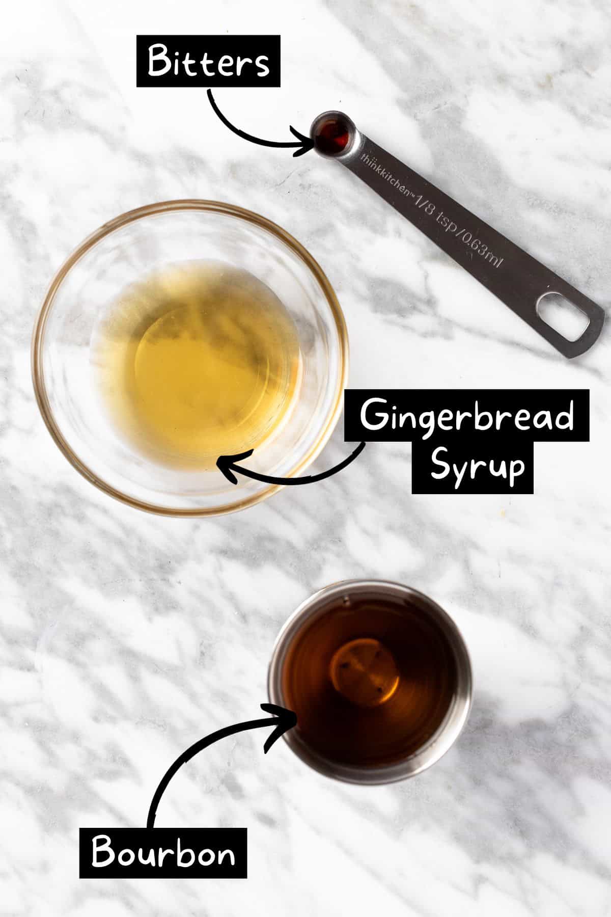 The ingredients needed to make the gingerbread old fashioned cocktail.