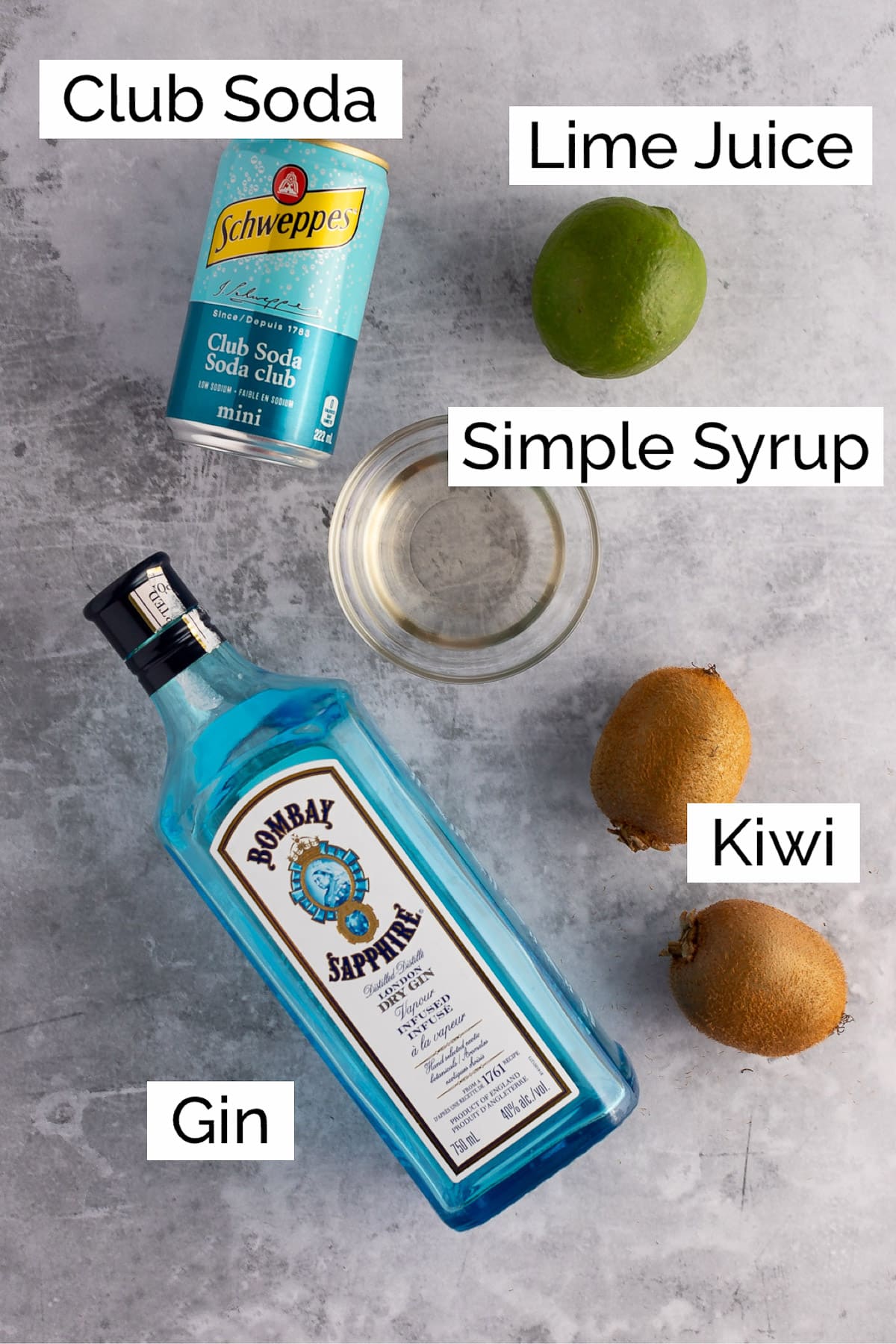 Overhead view of the ingredients needed to make the kiwi gin cocktail.