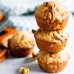 Three maple walnut muffins stacked on top of each other