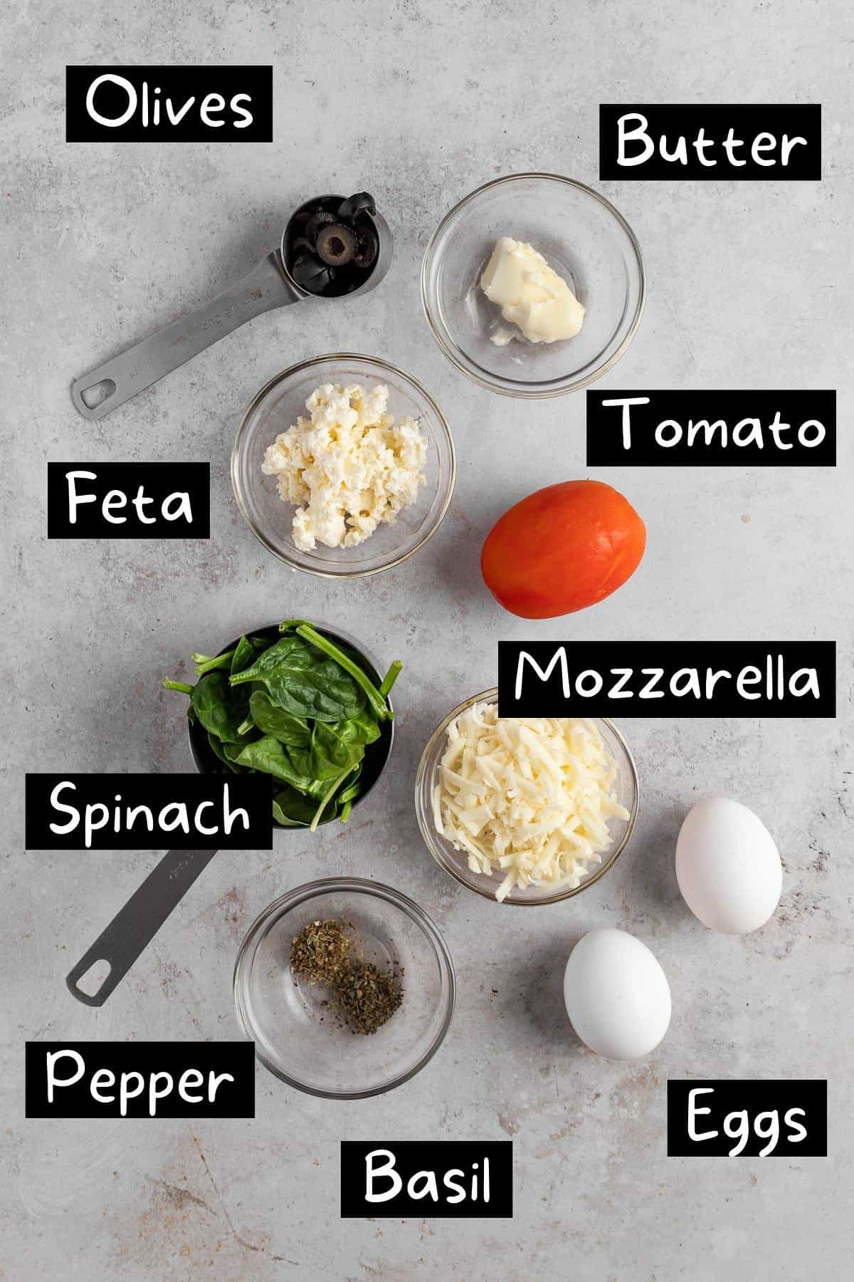 An overhead view of the ingredients needed to make the omelette.