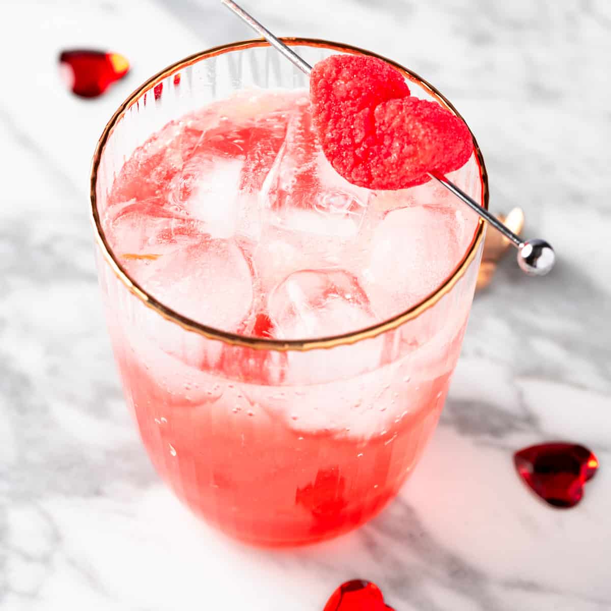 A Valentine’s Day Mocktail garnished with a heart marshmallow.